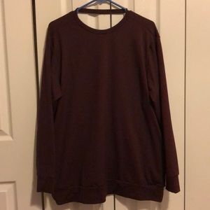 Womens Nike workout open back sweater. Size large but fits like an XL. NWOT